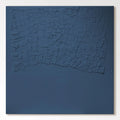 Minimalist blue canvas wall art with Wabi-Sabi texture, created using plaster and quartz sand, perfect for modern home decor.