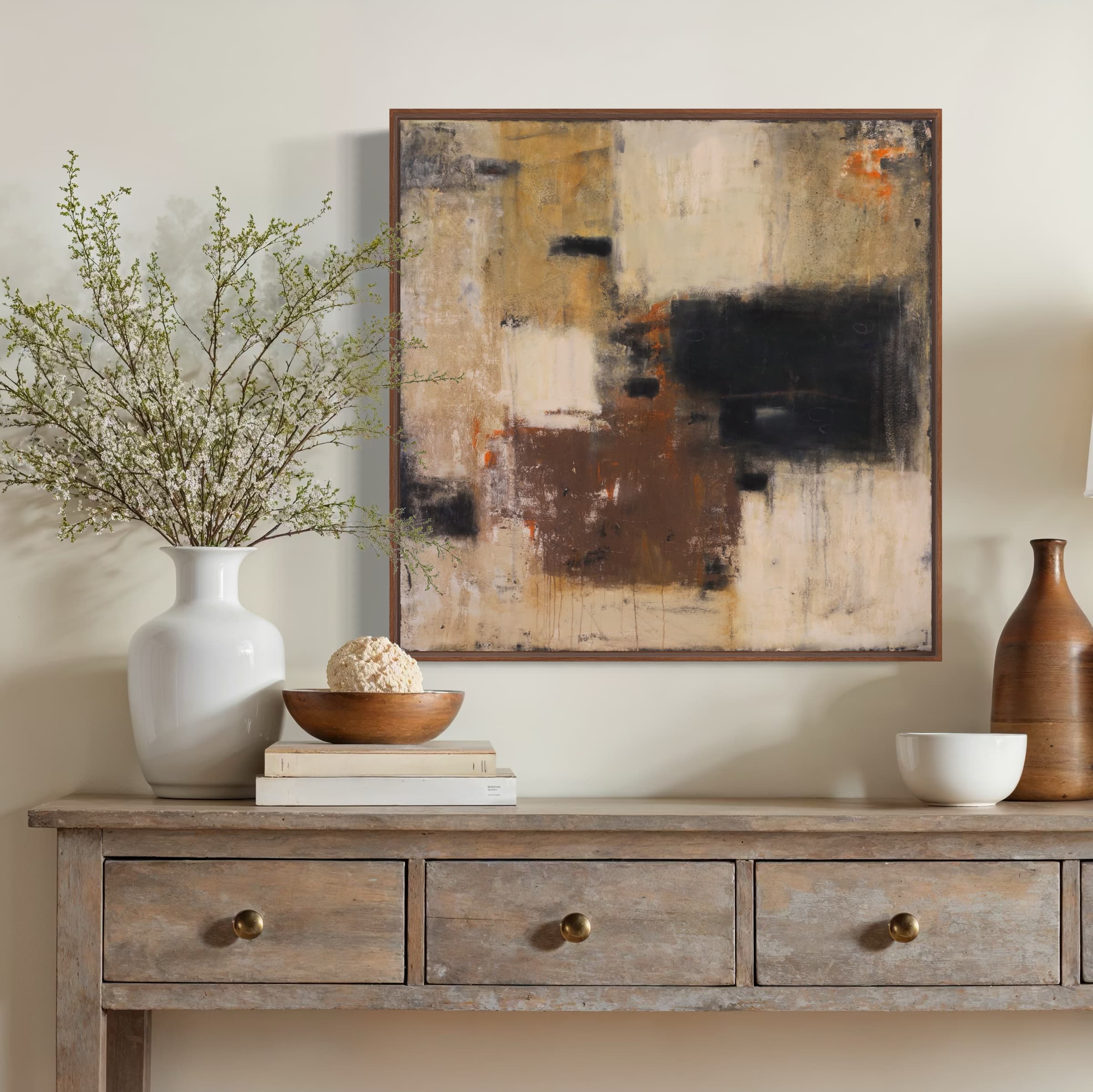 A minimalist abstract painting rendered in earthy browns, subtle beiges, and black, displayed on a balanced square canvas. Inspired by Wabi-Sabi principles, it offers a serene yet dynamic element for upscale residential or commercial spaces.