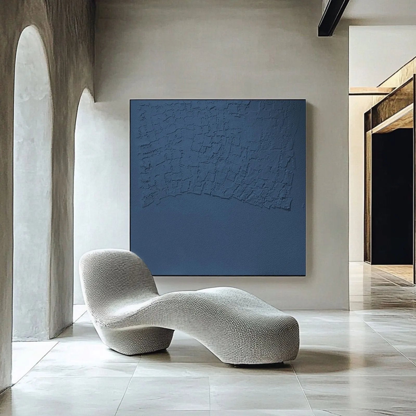Simple abstract painting in a subtle blue tone, featuring raw imperfections and natural materials for a timeless look.