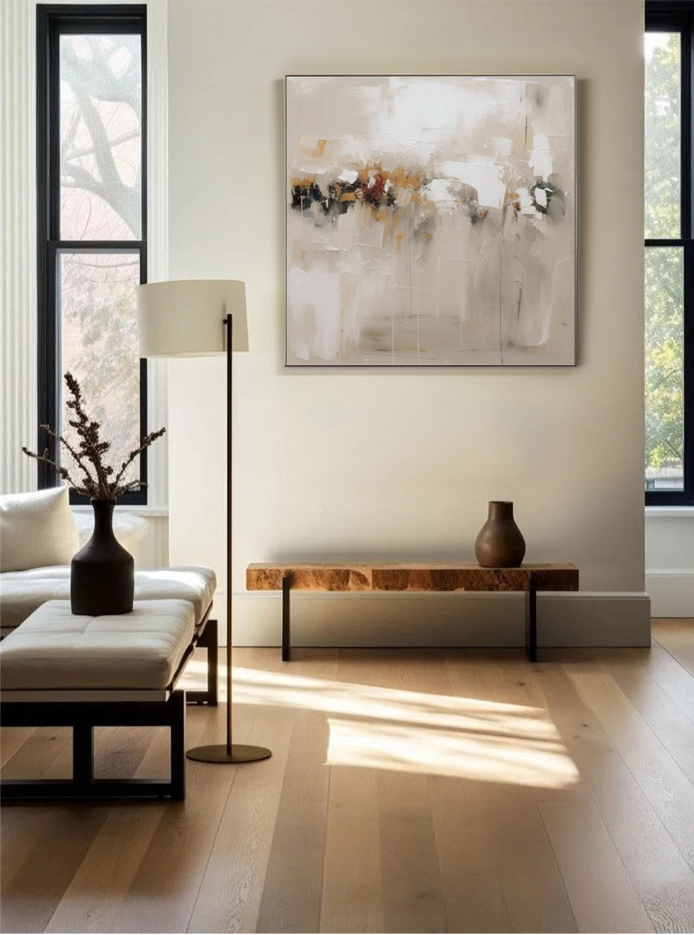 Modern living room with minimalist abstract canvas art.