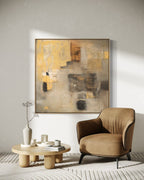 Abstract wall decor in a balanced square format, showcasing soft yellow, gray, and brown tones with a hint of rustic charm. This minimalist vintage piece adds a refined focal point to contemporary living spaces or boutique settings.