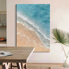 Minimalist ocean art displayed in a modern dining room setting.