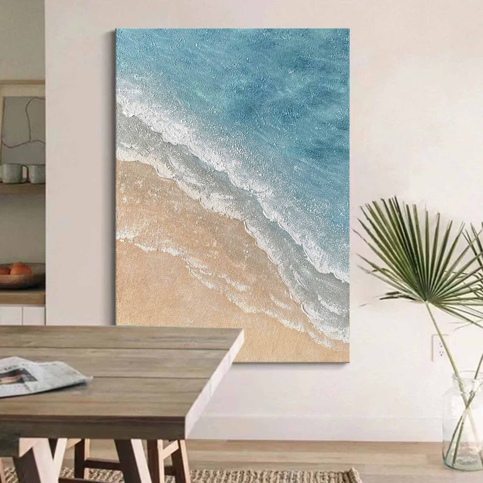 Minimalist ocean art displayed in a modern dining room setting.