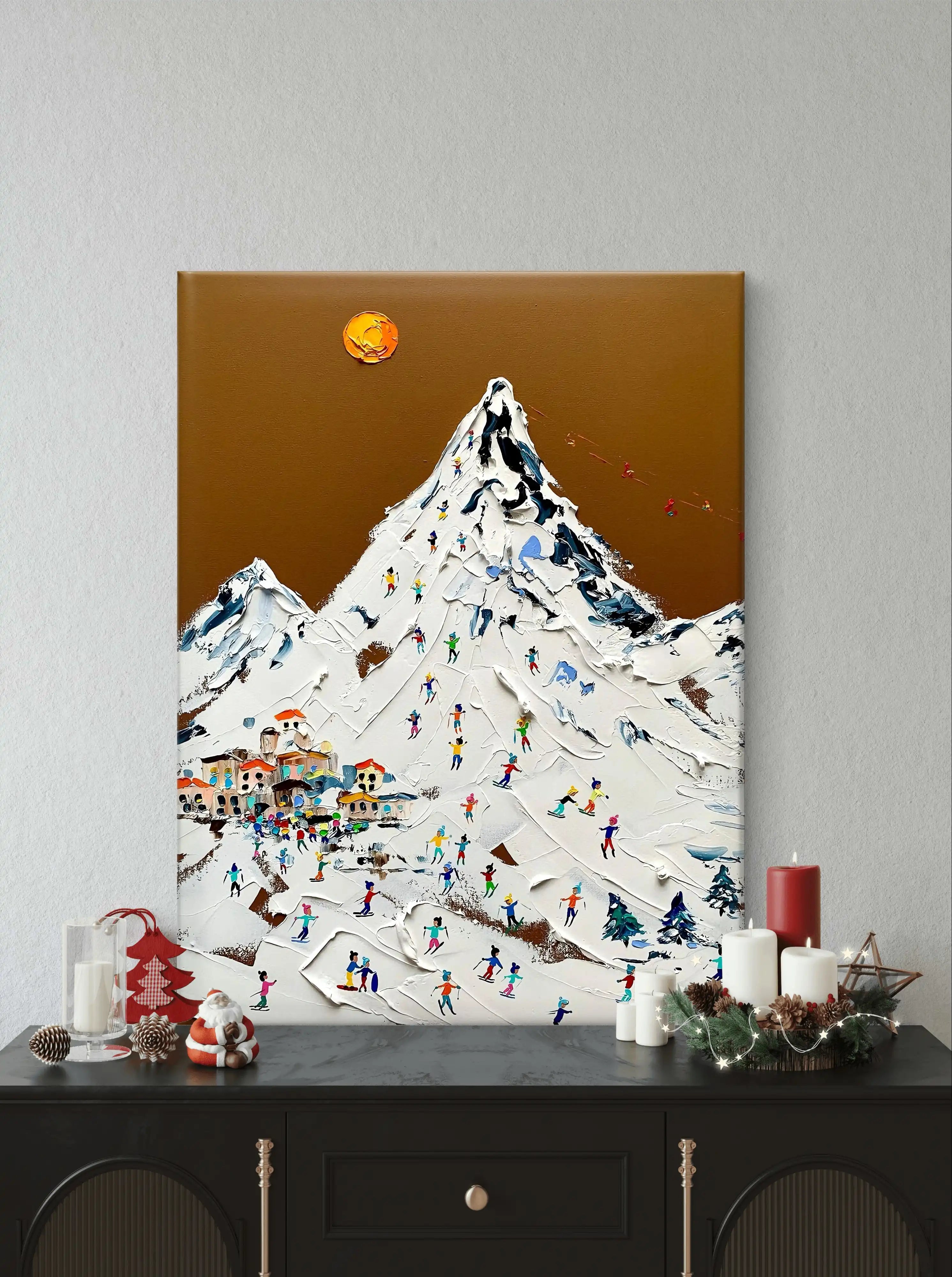 Hand-painted textured wall art depicting a vibrant ski resort scene with a snowy mountain, colorful skiers, and a golden sun.