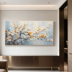 Modern hallway with 3D floral canvas art; cream and gold blossoms on blue-toned canvas.