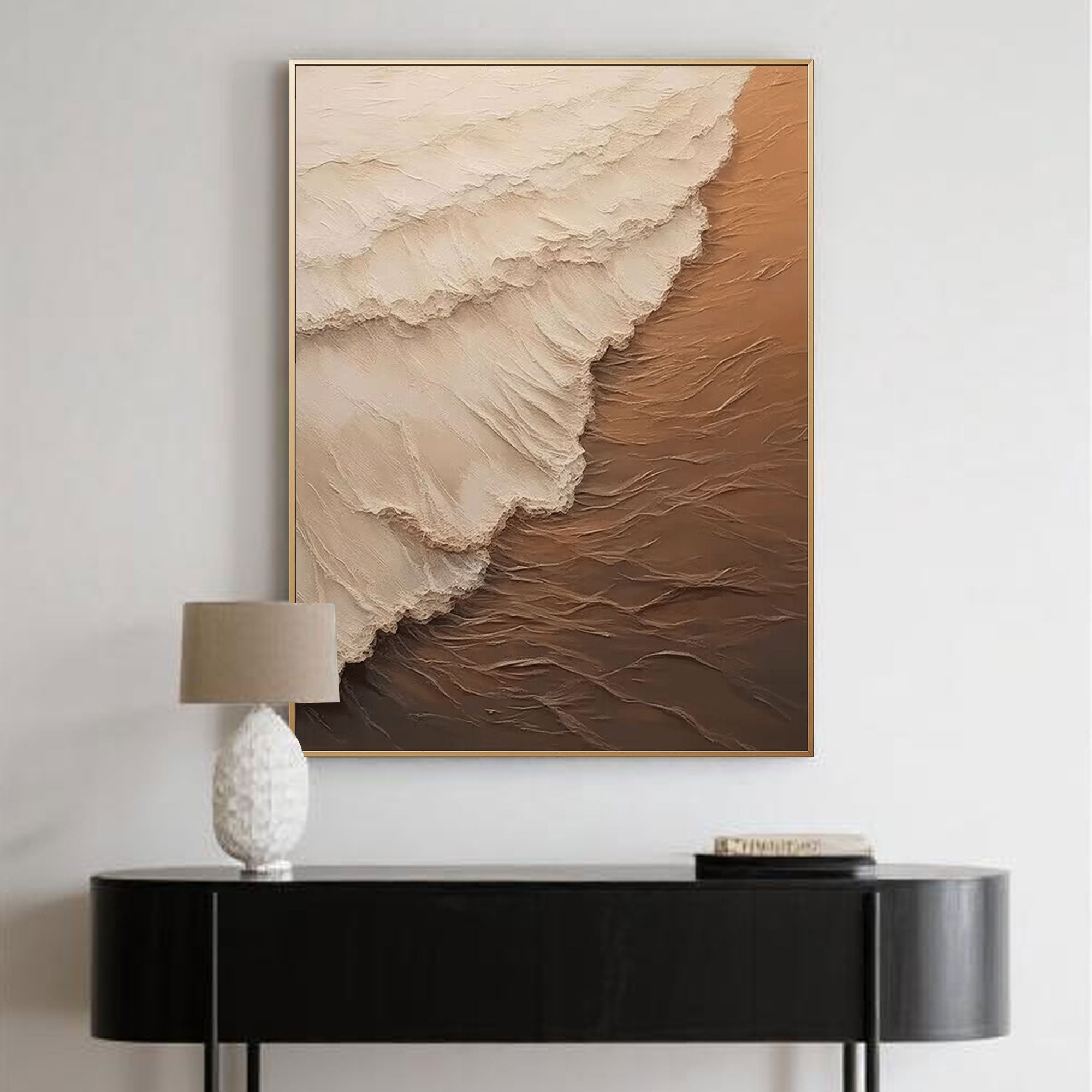 Vertical abstract canvas art in earthy tones above console table.