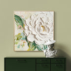 White peony 3D textured canvas wall art with green foliage, Lumi Gallery interior