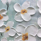Close-up of the 3D white floral texture on the Serenity wall art. Impasto paint details.