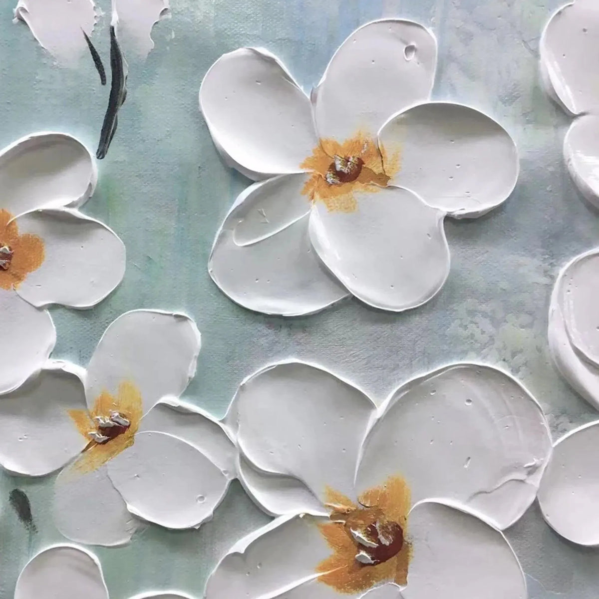 Close-up of the 3D white floral texture on the Serenity wall art. Impasto paint details.