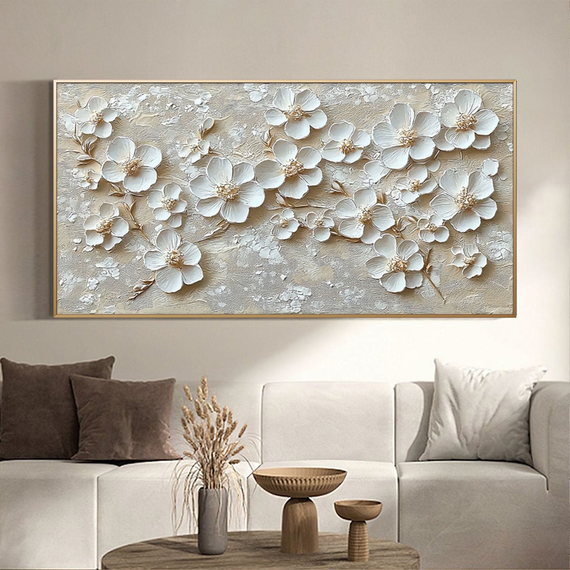 Beige floral canvas art in a stylish living room above a comfortable couch.