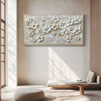3D floral beige wall art with sculpted white flowers and textured canvas.
