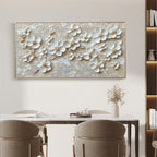 Beige floral canvas art in a stylish living room above a comfortable couch.
