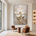 Vertical flower canvas art in neutral tones in a modern interior space..
