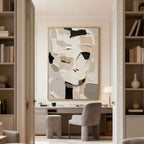 3D textured abstract portrait canvas art with black/white/beige tones in modern home office by Lumi Gallery