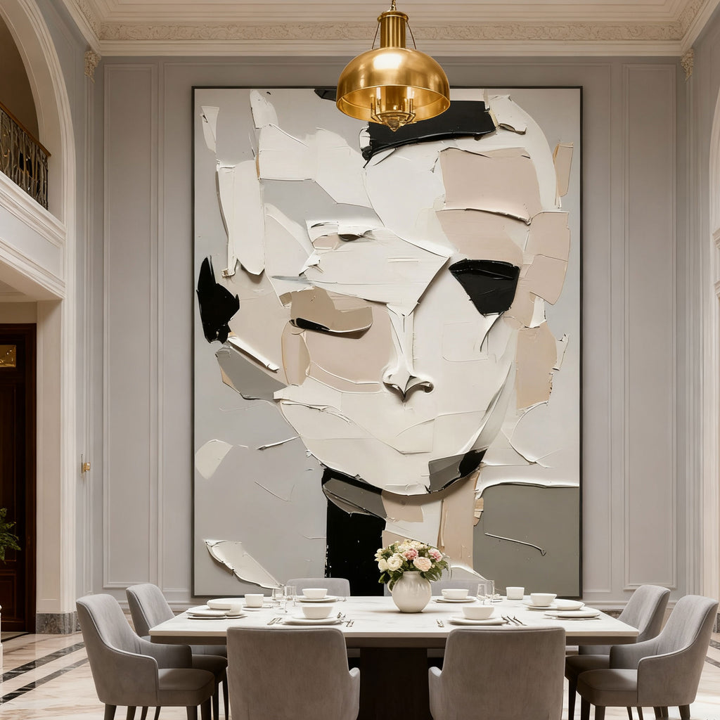 3D textured abstract portrait canvas art 'Silent Self' with layered white, beige, black, and gray tones, displayed in a dining room with a marble table, gray chairs, and gold pendant light.