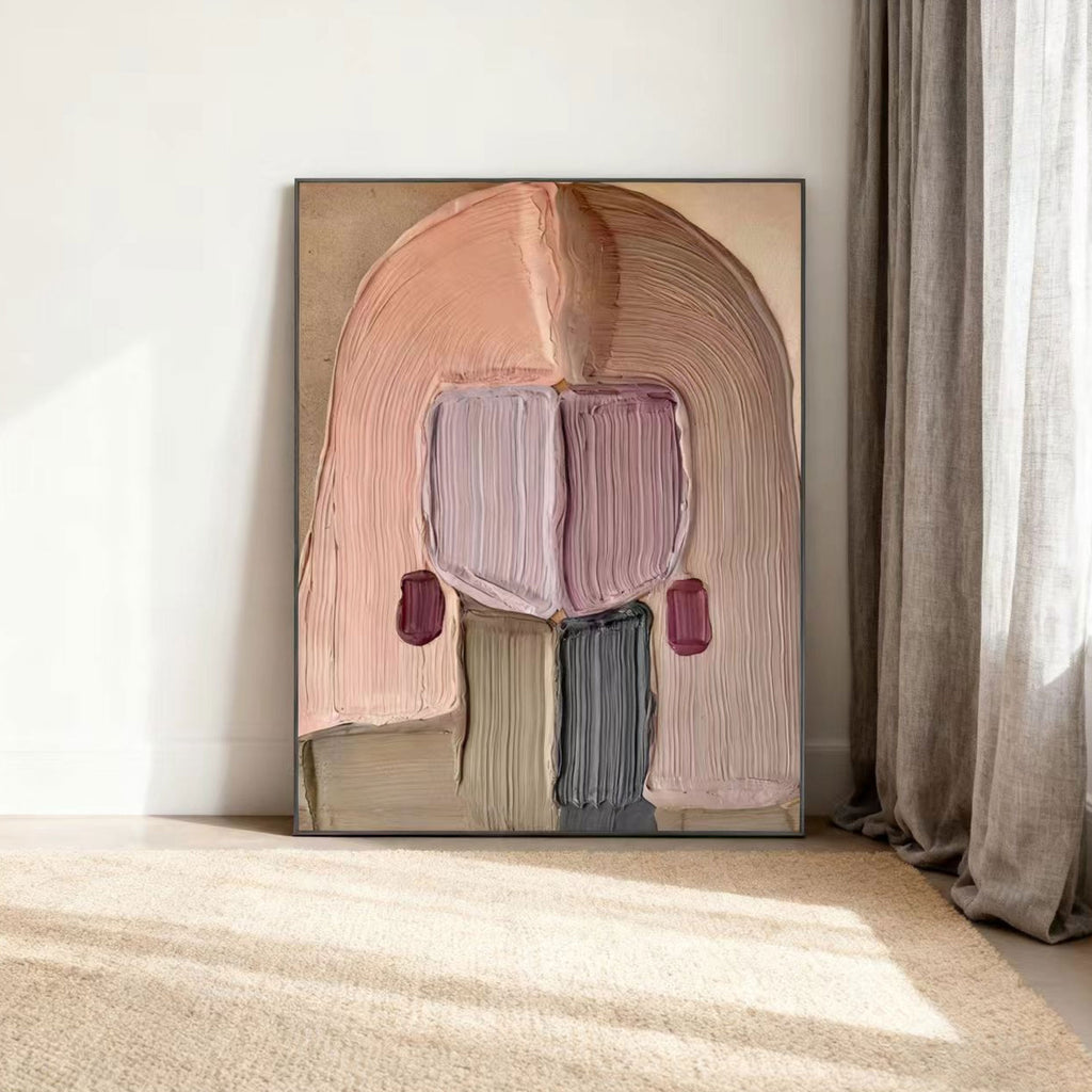 3D textured abstract portrait wall art in soft pinks/purples, framed, modern room