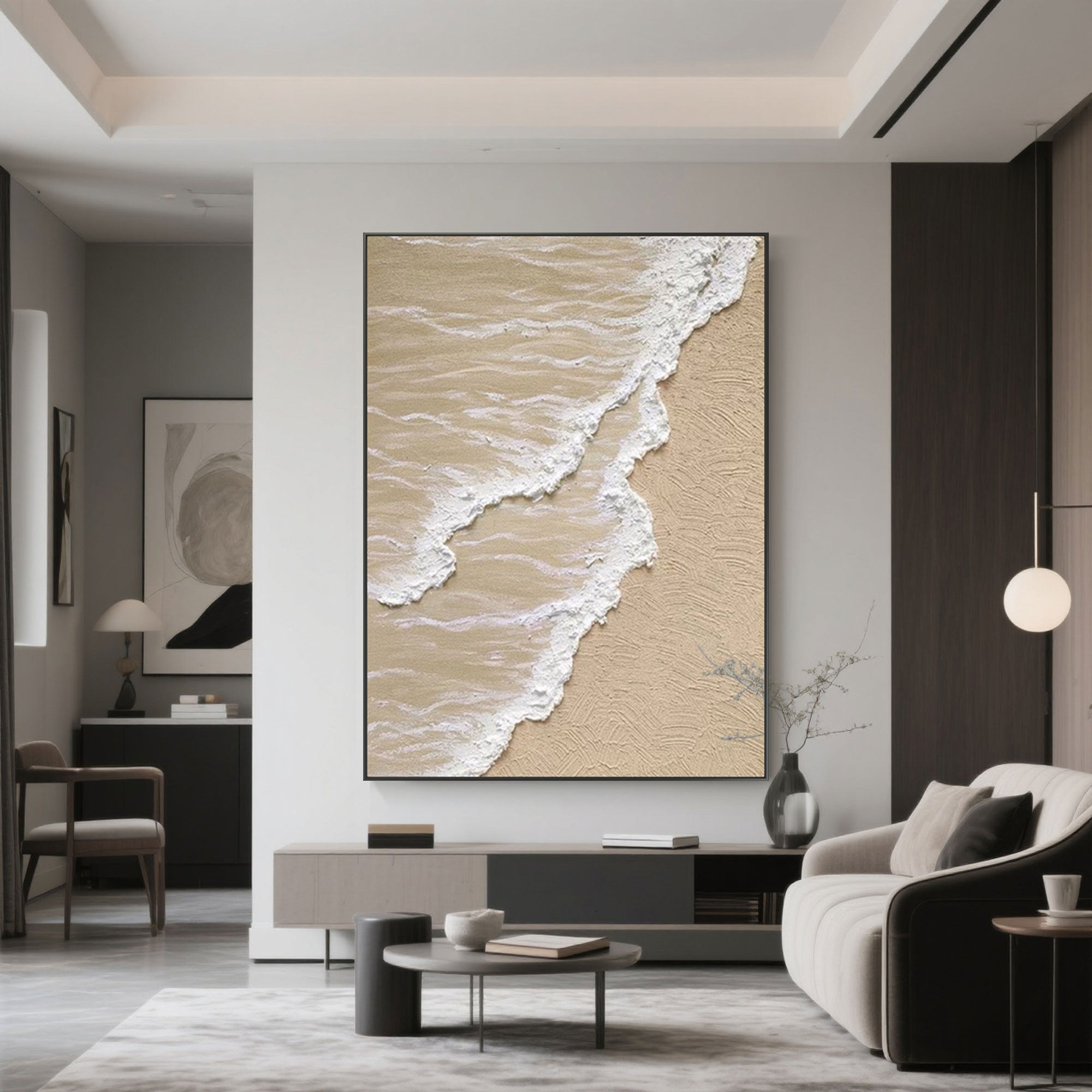 Vertical 'Shoreline' canvas art above console in neutral living space.
