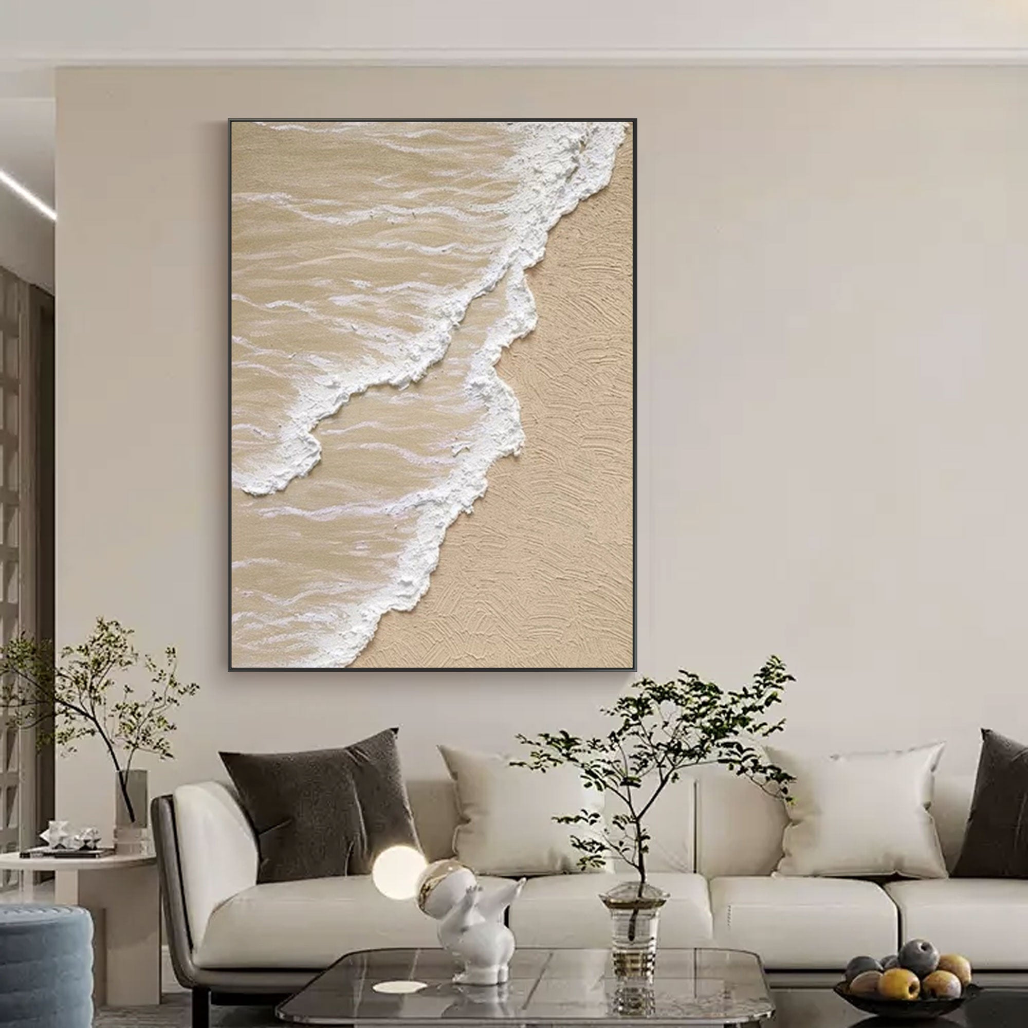 Vertical 'Shoreline' canvas art above console in neutral living space.