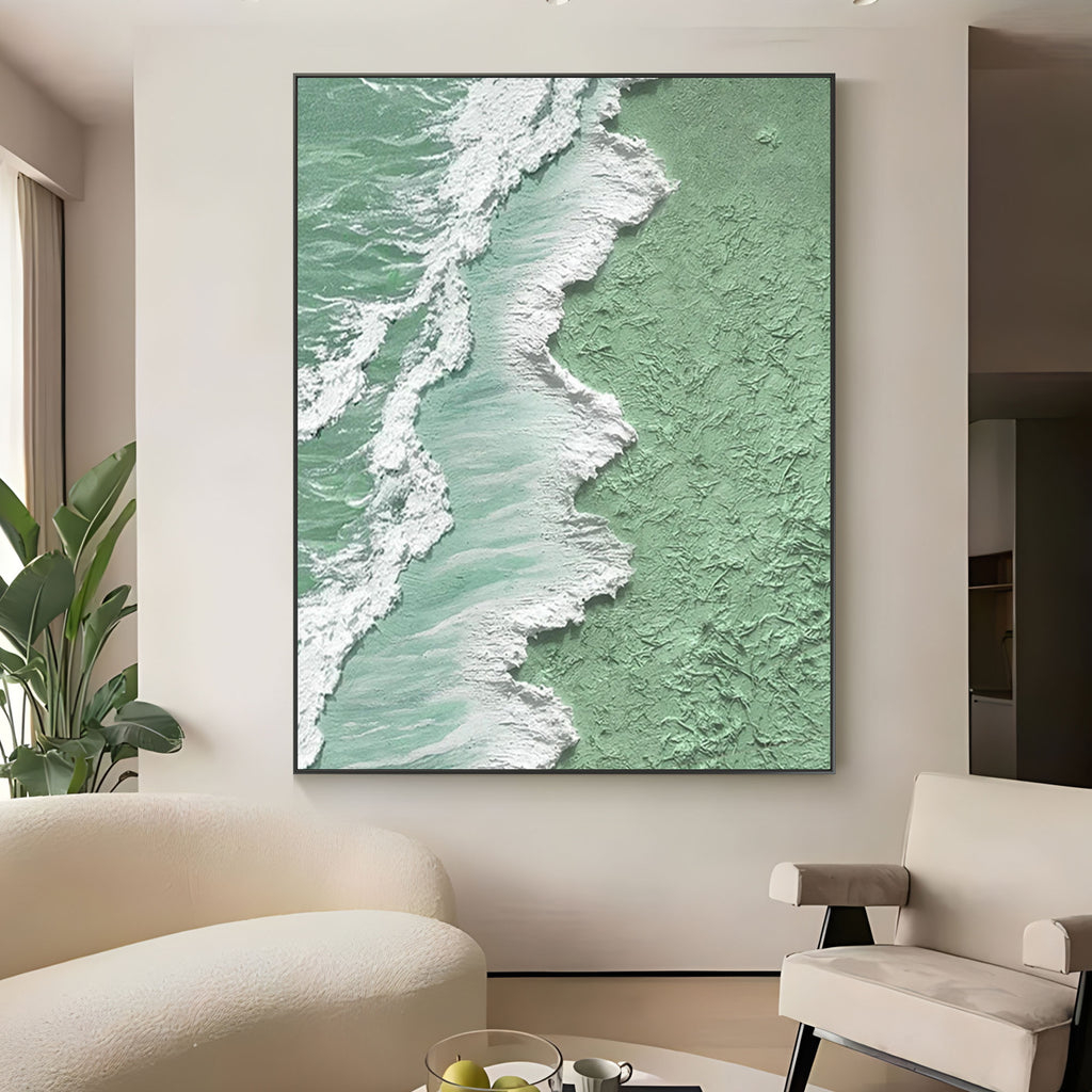 Green and white 'Tidal Green' wave painting above a sofa.