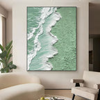 Green and white 'Tidal Green' wave painting above a sofa.