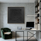 3D textured minimalist black wall art 'Silent Lines' in modern office with concrete walls