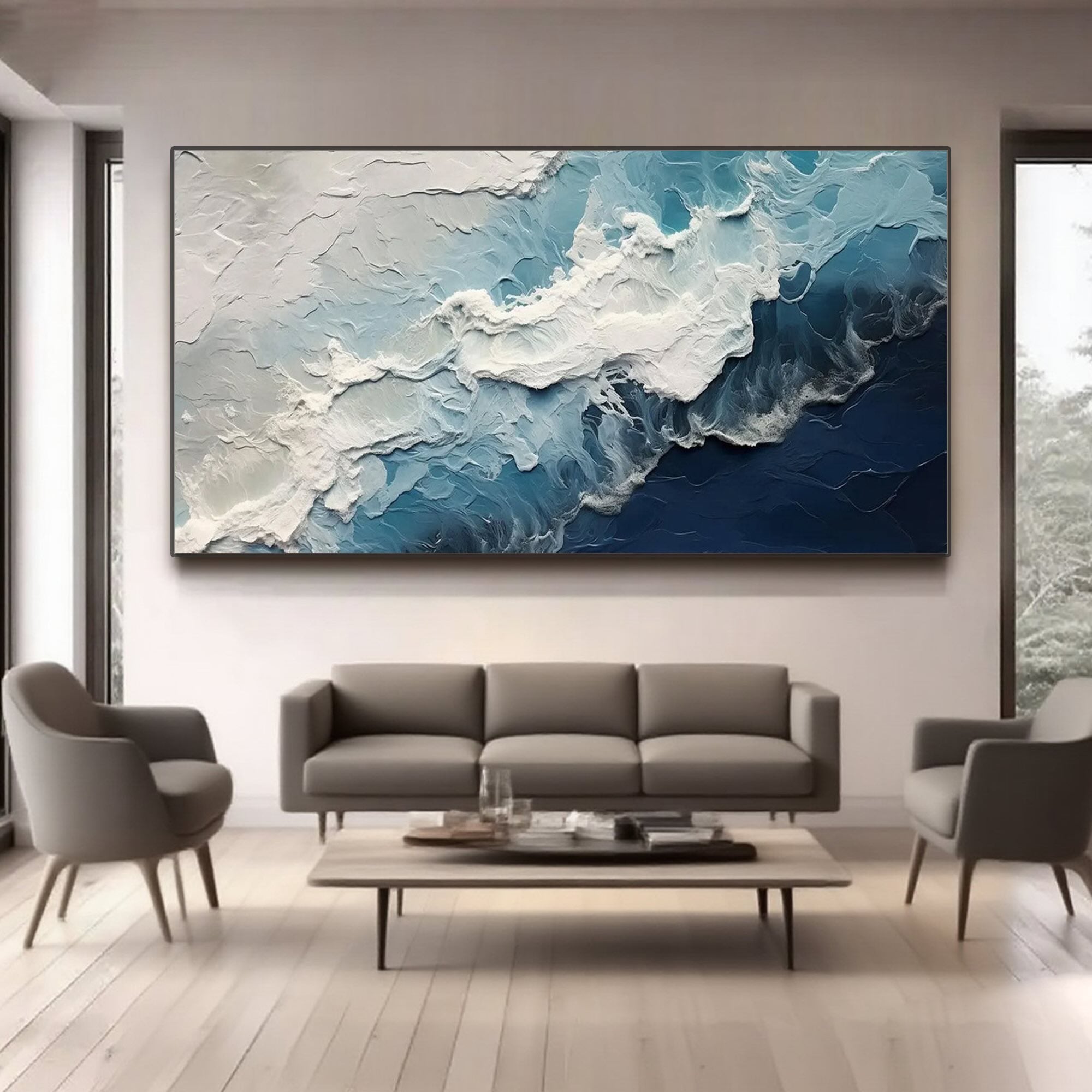 Blue wave canvas art hanging above a sofa in a modern living room.