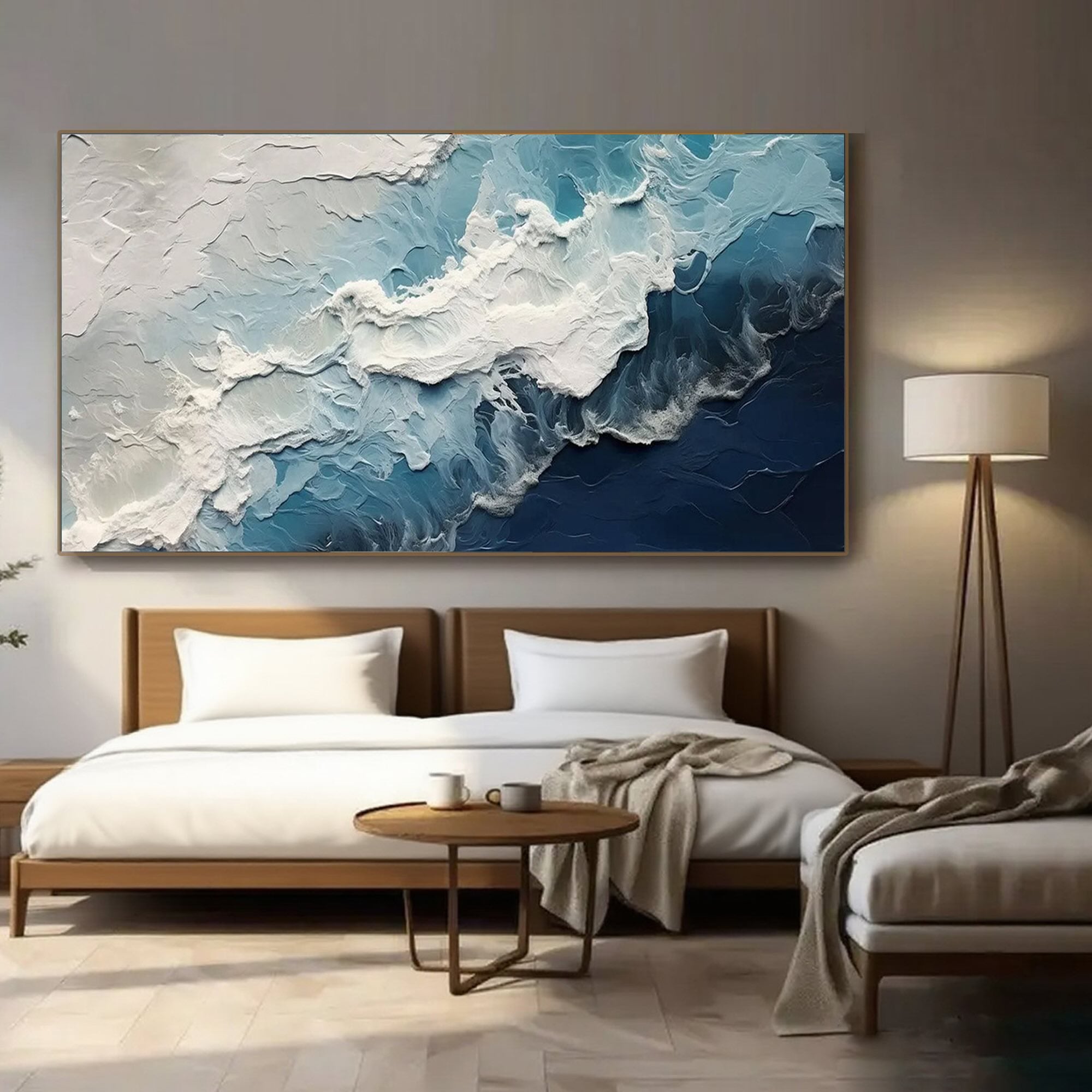 Hand-painted abstract ocean wall art in cool blue, white, and navy tones