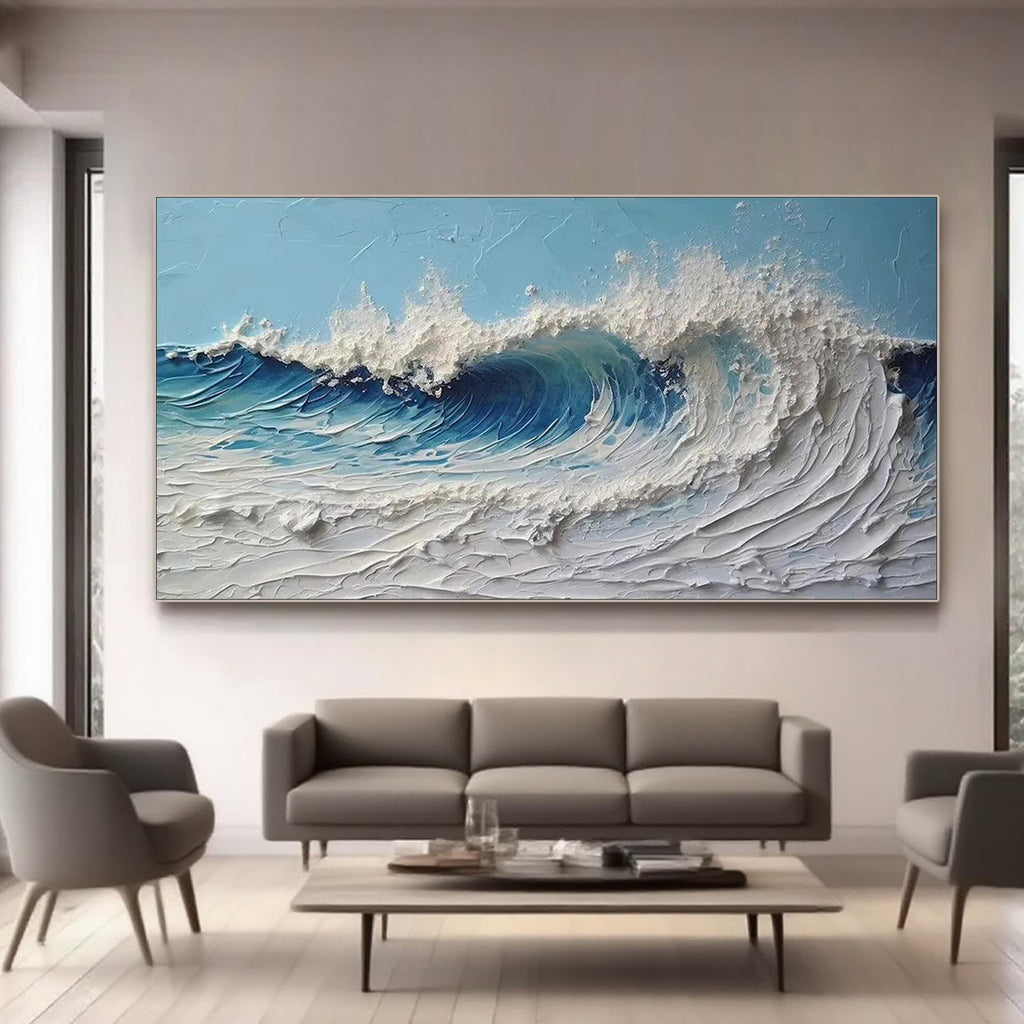 Textured ocean wave canvas art displayed in a modern living room.