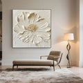 Lumen white floral canvas art displayed above a chaise lounge.