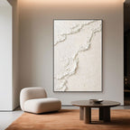 3D textured 'Sandy Wave' canvas art in white and beige.