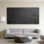 Black 3D textured abstract wall art 'Obsidian Field' in contemporary living room at Lumi Gallery