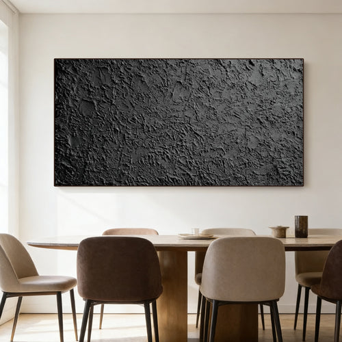 Lumi Gallery's 3D textured black abstract wall art 'Obsidian Field' mounted on white wall over dining set