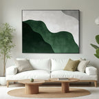 Green Horizon canvas art displayed above a white sofa in living room.