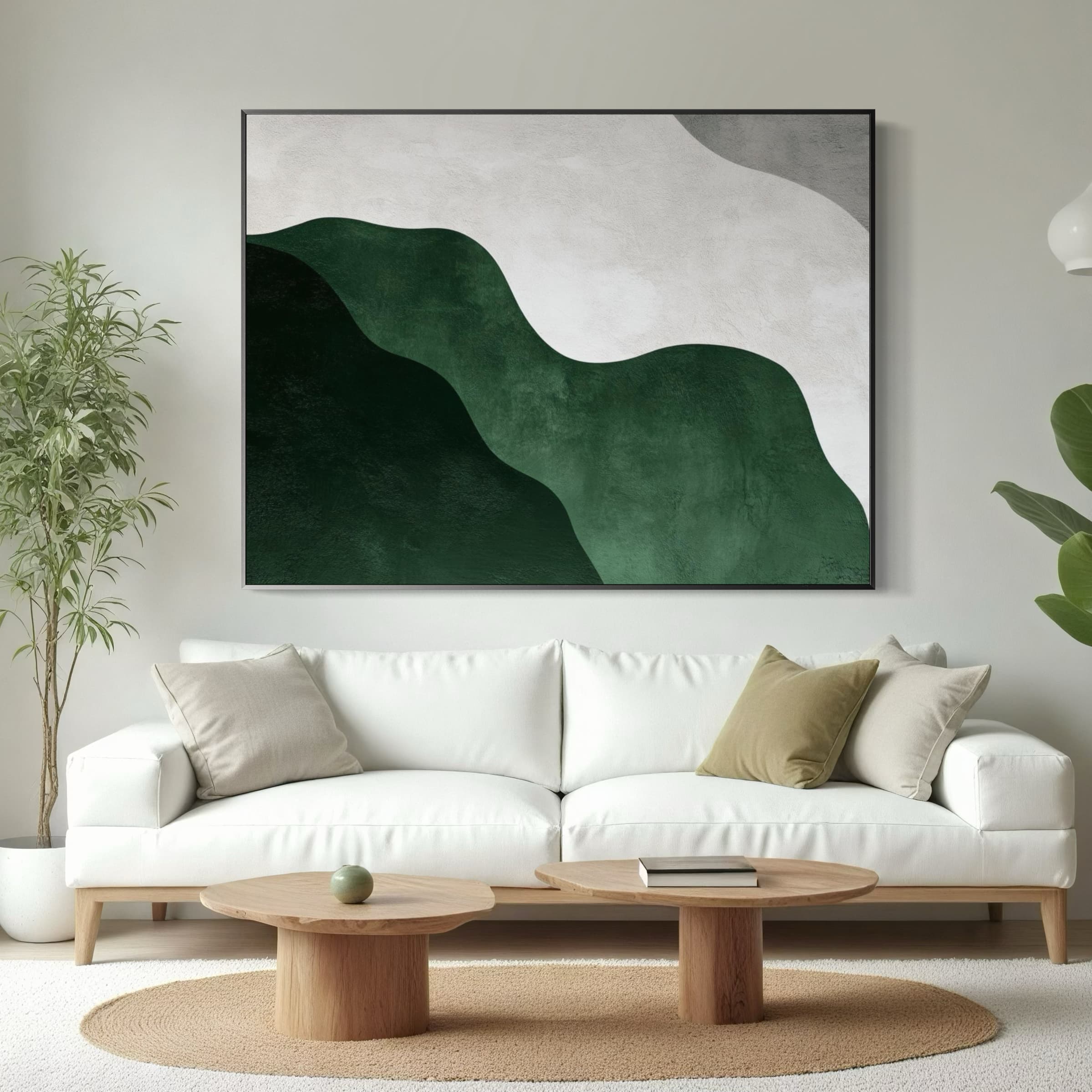 Green Horizon canvas art displayed above a white sofa in living room.
