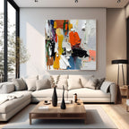 Bright and airy room setting highlighting colorful 3D textured abstract wall art, hand-painted with eco-friendly acrylics, bringing energy and movement to the decor with square-shaped museum-quality canvas.