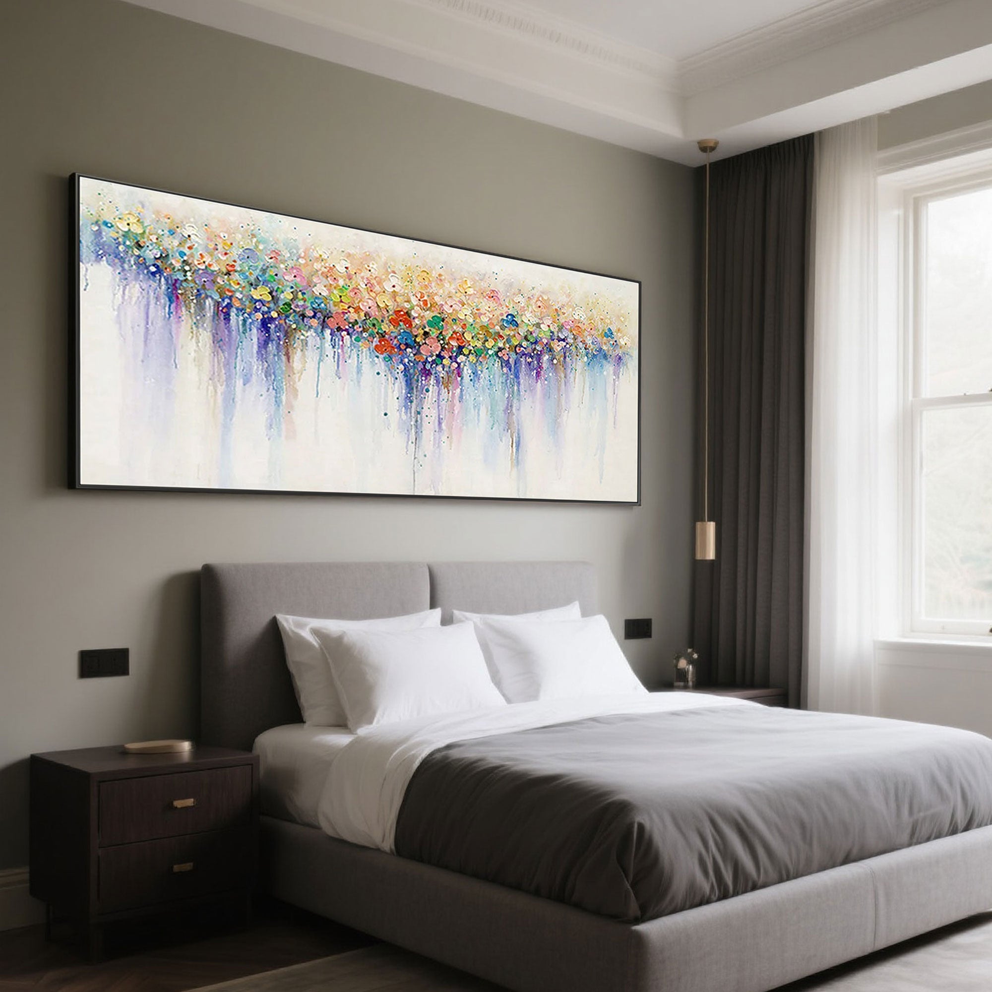 Whimsy abstract art with colorful dots in a black frame above a bed.