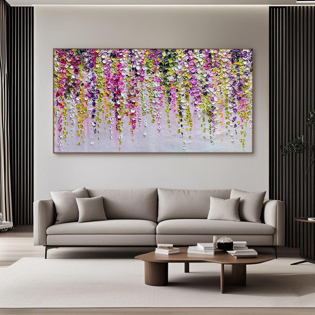 Abstract floral canvas art displayed above a sofa in a modern living room.