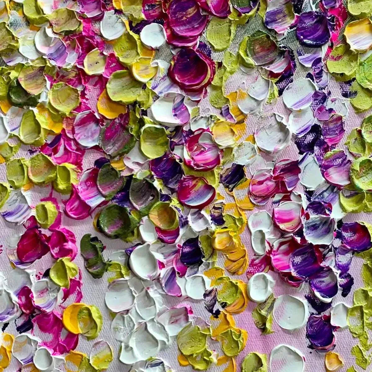 Close-up of textured floral painting with vibrant pink, purple, green, and yellow hues.