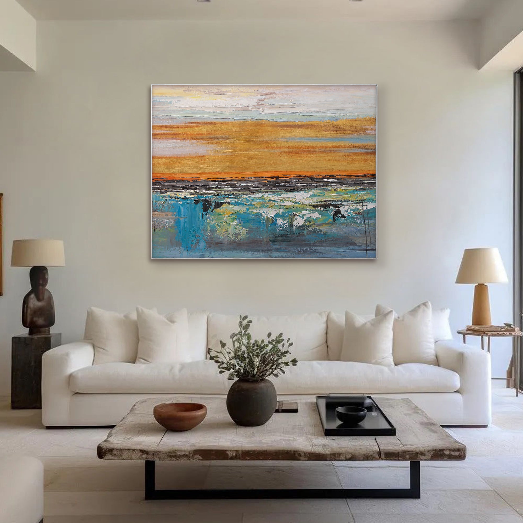 Living room view of abstract 'Dusk' canvas art above a sofa setting.