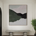 Green and black 'Divide' abstract art in minimalist room setting.