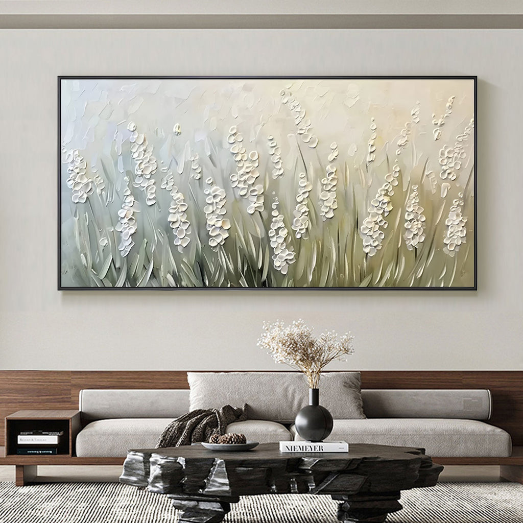 3D textured floral canvas art above a modern sofa.