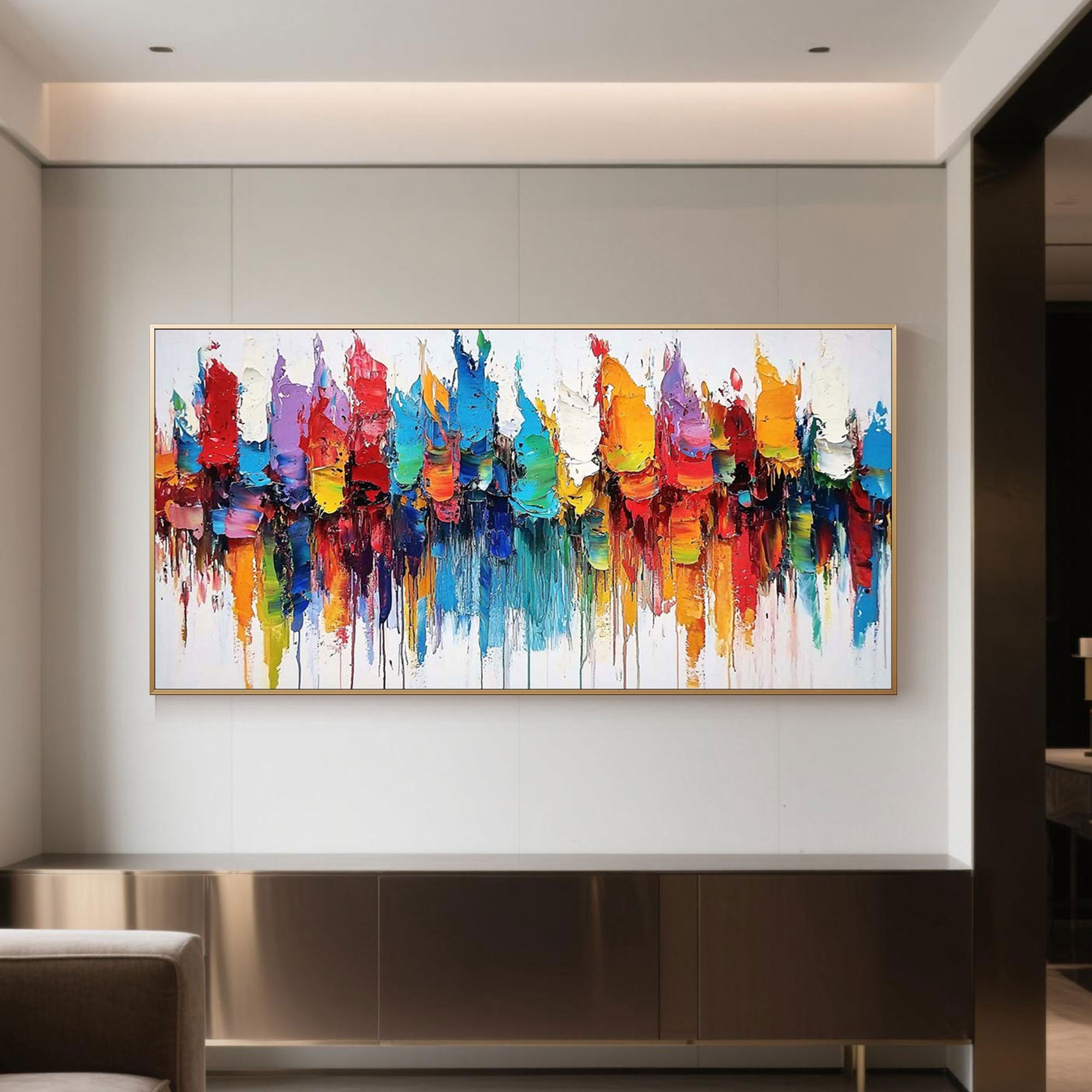 Abstract canvas art with a gold metal frame.