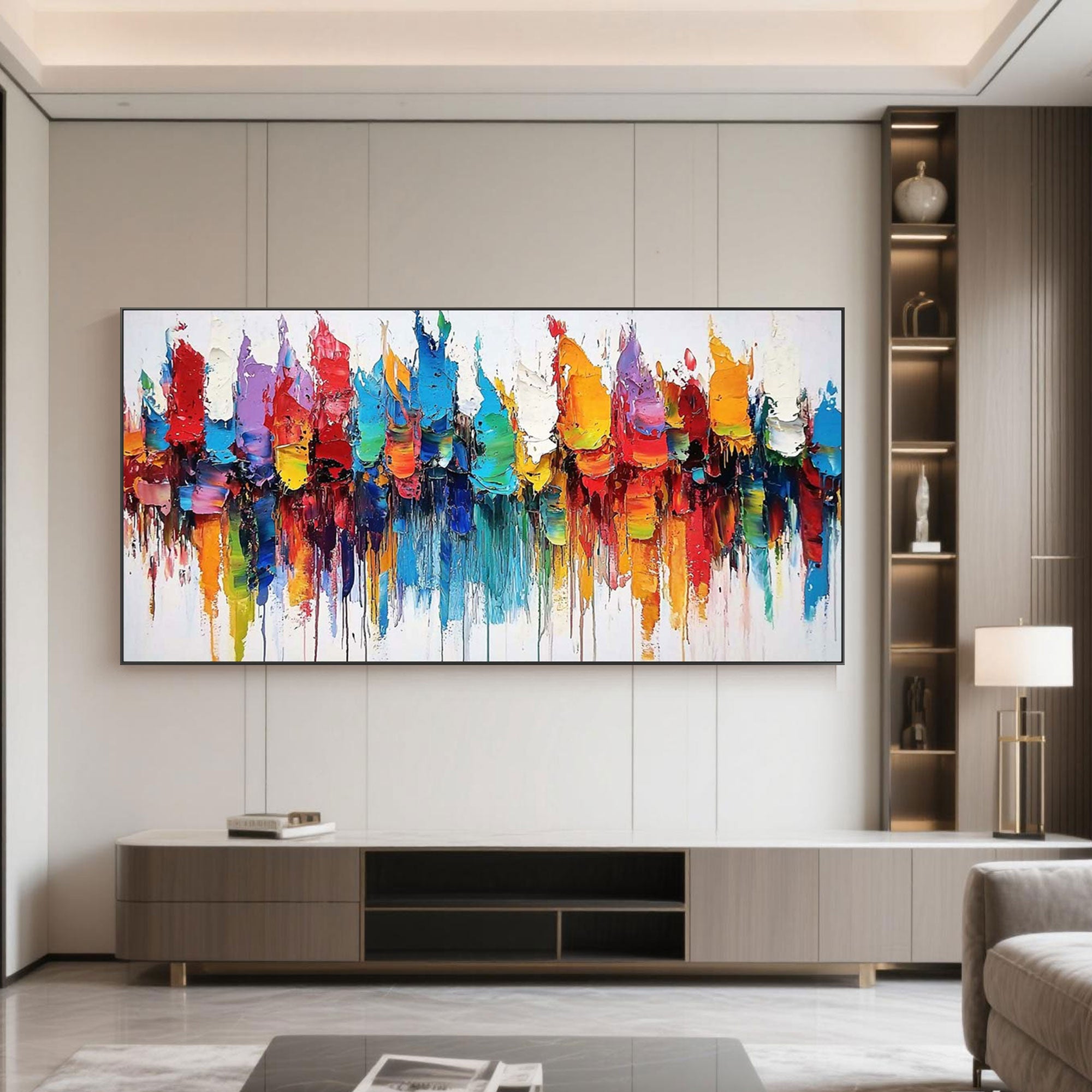 Abstract canvas art above console table in modern living room.