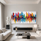 Abstract colorful canvas art in modern living room setting.