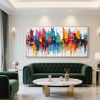 Abstract colorful canvas art with a silver metal frame.
