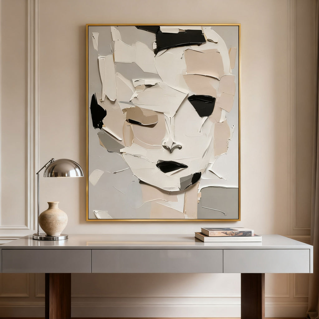 Abstract modern portrait canvas art 'Fragmented Calm' with textured paint, gold frame, displayed over contemporary desk at Lumi Gallery