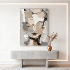 Abstract modern neutral portrait canvas art 'Soft Restraint' by Lumi Gallery, mounted above marble console