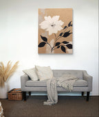Neutral toned floral painting with creamy texture and minimalist white flower on beige canvas