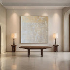 Beige Wabi Sabi art in a modern living room with lamps.