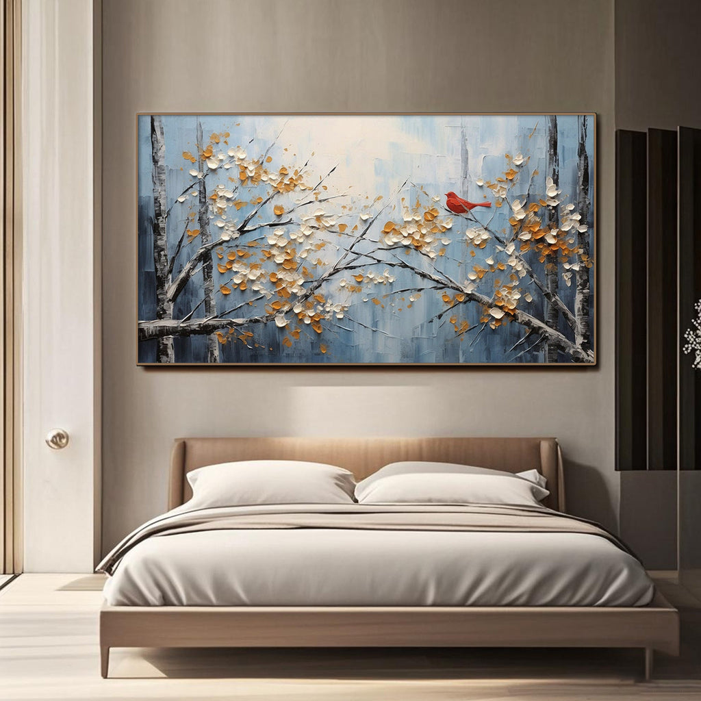 ​Blue and white abstract painting enhancing a minimalist bedroom decor as a headboard focal point